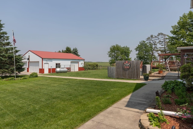 10706 65th Ave SE, Stewartville, MN 55976 - view of yard with a garage and an outdoor structure