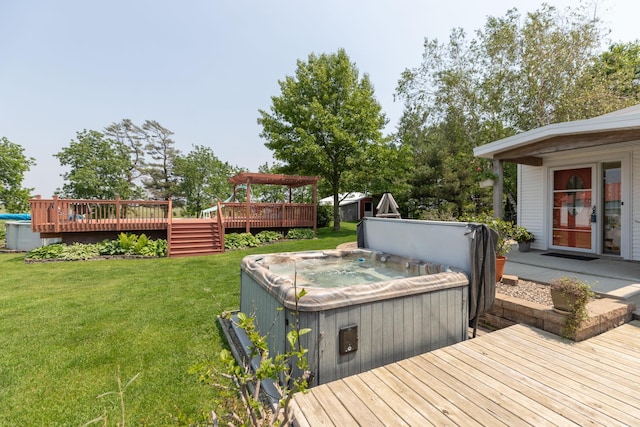 10706 65th Ave SE, Stewartville, MN 55976 - wooden terrace with a hot tub and a yard