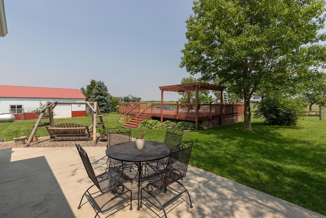 10706 65th Ave SE, Stewartville, MN 55976 - view of patio with a pergola, outdoor dining area, stairway, and a deck
