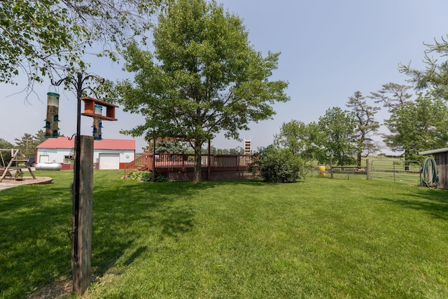 10706 65th Ave SE, Stewartville, MN 55976 - view of yard with a deck and a playground