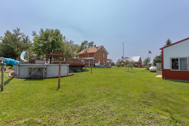 10706 65th Ave SE, Stewartville, MN 55976 - view of green lawn featuring an outdoor pool