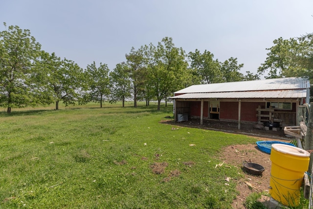 10706 65th Ave SE, Stewartville, MN 55976 - view of yard featuring an outdoor structure and an exterior structure