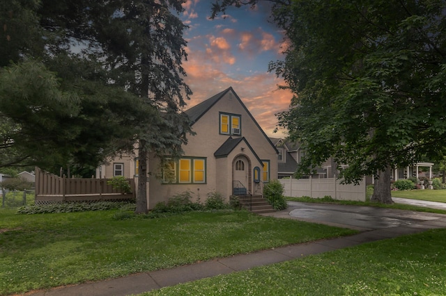 613 Oak St, Farmington, MN 55024 - view of front of house featuring stucco siding and a wooden deck