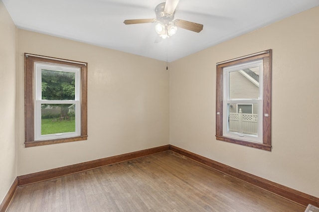 613 Oak St, Farmington, MN 55024 - empty room featuring wood finished floors and a ceiling fan
