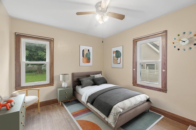 613 Oak St, Farmington, MN 55024 - bedroom featuring wood finished floors and a ceiling fan