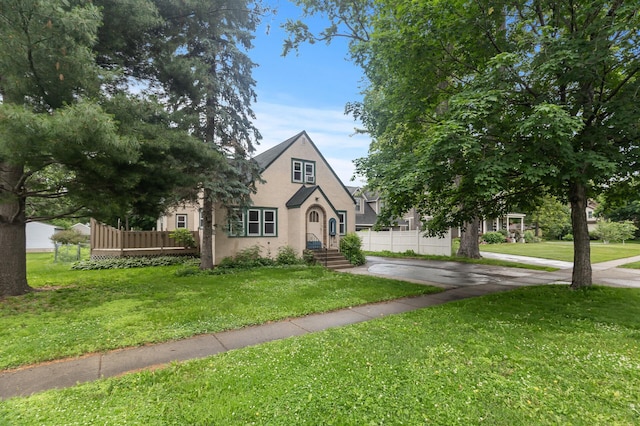 613 Oak St, Farmington, MN 55024 - view of front of property with stucco siding and a front yard