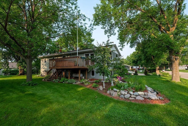 505 1st Ave, Raymond, MN 56282 - view of grassy yard with stairway and a wooden deck