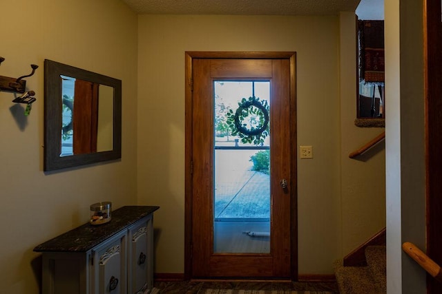 505 1st Ave, Raymond, MN 56282 - entrance foyer with baseboards and stairs