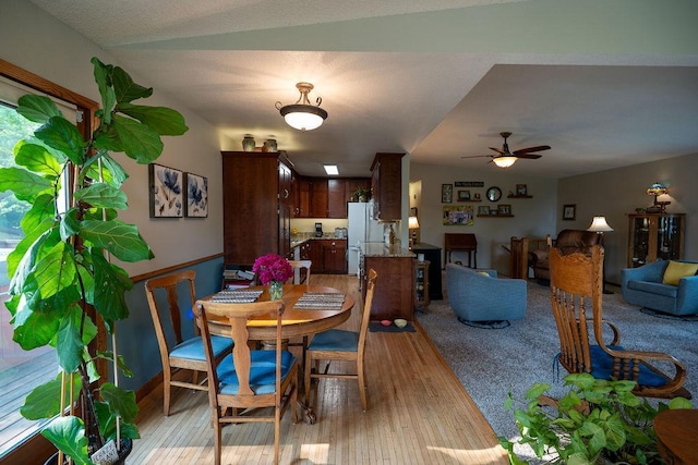 505 1st Ave, Raymond, MN 56282 - dining area with light wood-type flooring and ceiling fan