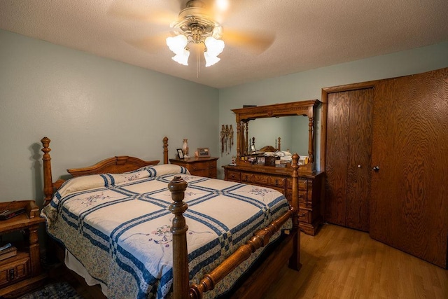 505 1st Ave, Raymond, MN 56282 - bedroom with light wood-type flooring and ceiling fan