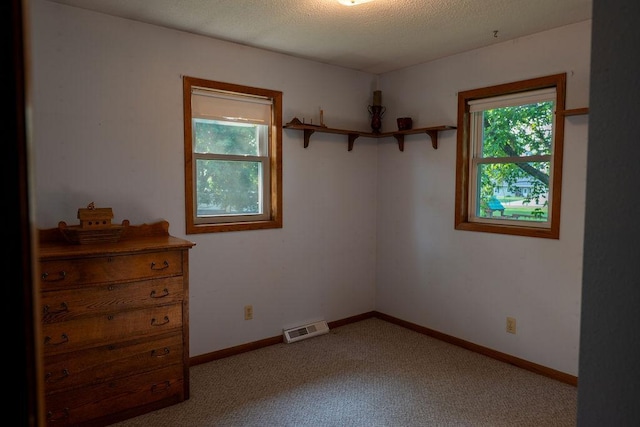 505 1st Ave, Raymond, MN 56282 - spare room featuring light carpet and baseboards