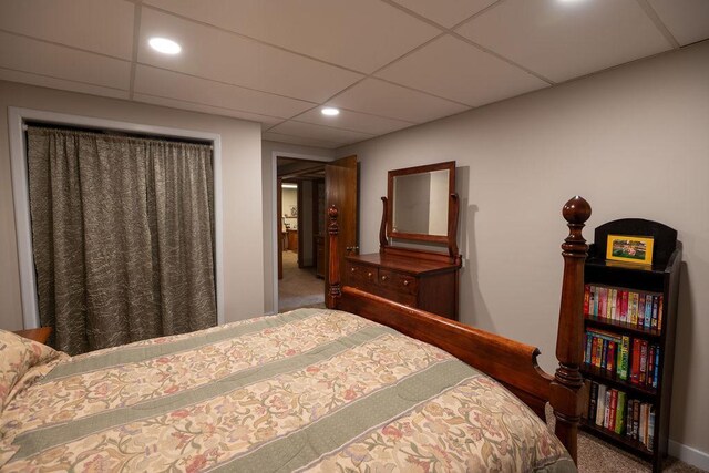 505 1st Ave, Raymond, MN 56282 - carpeted bedroom featuring a paneled ceiling and recessed lighting
