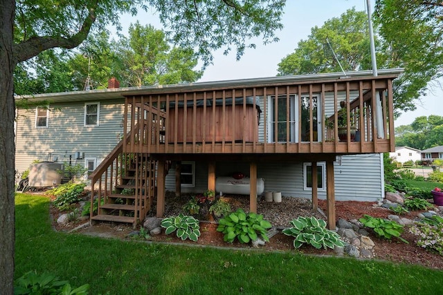 505 1st Ave, Raymond, MN 56282 - back of property featuring a deck, stairs, and a chimney