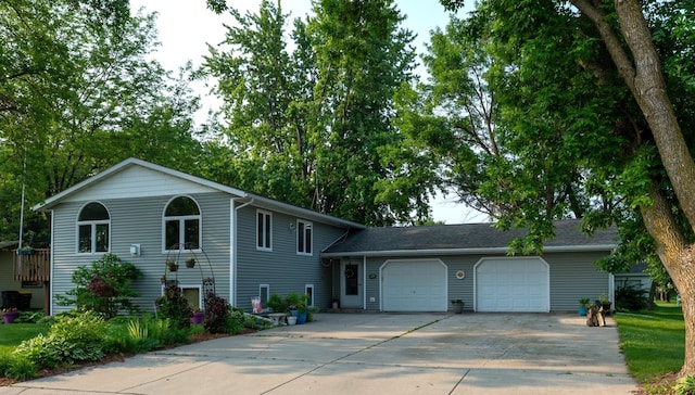 505 1st Ave, Raymond, MN 56282 - tri-level home with a garage and driveway