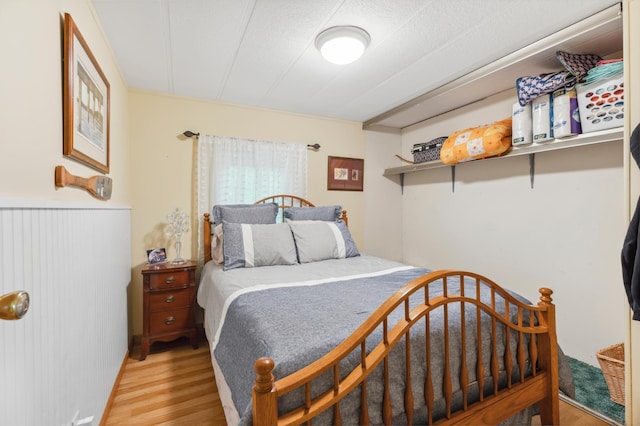 22325 519th Ln, Workman Twp, MN 55760 - bedroom featuring wood finished floors