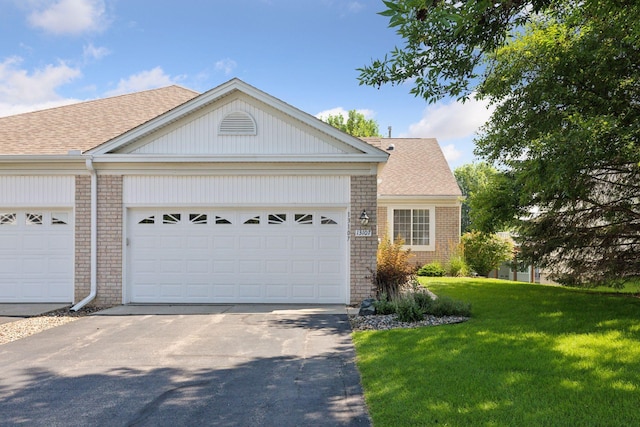 13107 Falcons Way, Savage, MN 55378 - single story home featuring brick siding, asphalt driveway, and a shingled roof