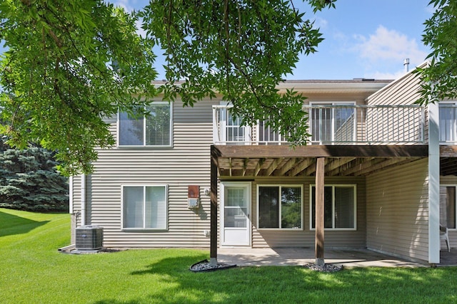 13107 Falcons Way, Savage, MN 55378 - back of property featuring a yard, a patio, and a deck