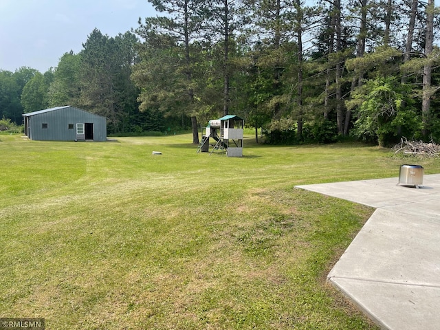 21507 County Road 560, Goodland Twp, MN 55742 - view of grassy yard with a playground