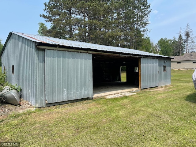 21507 County Road 560, Goodland Twp, MN 55742 - view of pole building featuring a lawn