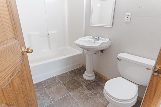 824 9th St N, Fargo, ND 58102 - full bath with shower / tub combination and stone finish flooring
