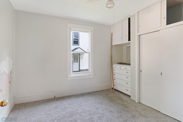 824 9th St N, Fargo, ND 58102 - unfurnished bedroom with light colored carpet