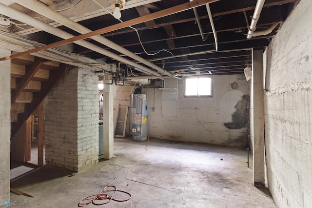 824 9th St N, Fargo, ND 58102 - basement featuring water heater and stairway