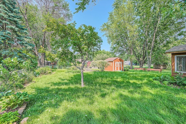 5774 213th St N, Forest Lake, MN 55025 - view of green lawn with a storage shed