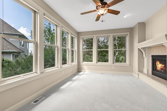 10701 Sonoma Rdg, Eden Prairie, MN 55347 - unfurnished sunroom featuring baseboards and carpet floors