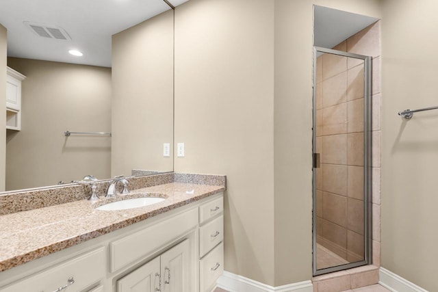 10701 Sonoma Rdg, Eden Prairie, MN 55347 - bathroom with vanity, a shower stall, and recessed lighting