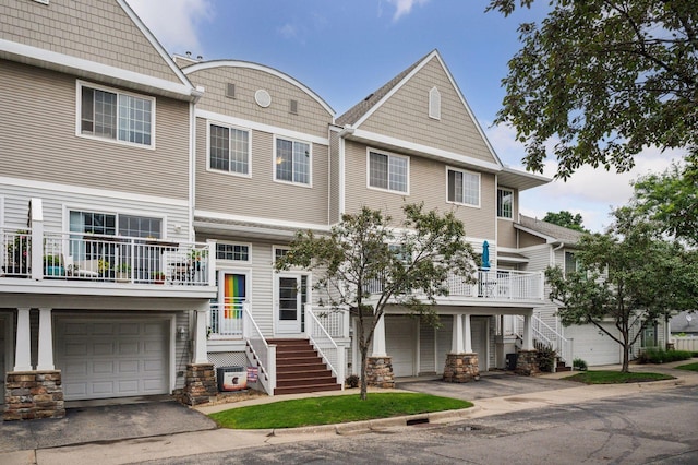 7601 Garfield Ave Unit 103, Richfield, MN 55423 - view of property with an attached garage and driveway