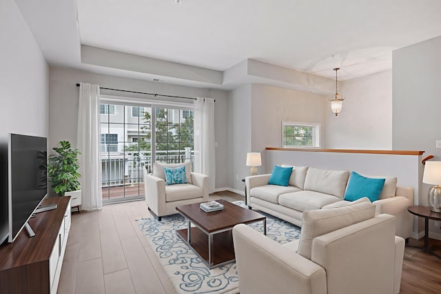 7601 Garfield Ave Unit 103, Richfield, MN 55423 - living area with healthy amount of natural light and wood finished floors