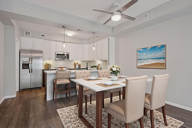 7601 Garfield Ave Unit 103, Richfield, MN 55423 - dining room featuring dark wood-type flooring and ceiling fan
