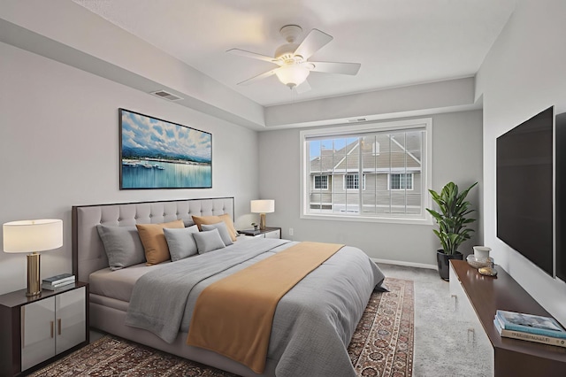 7601 Garfield Ave Unit 103, Richfield, MN 55423 - carpeted bedroom with baseboards and a ceiling fan