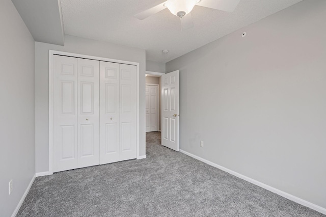 7601 Garfield Ave Unit 103, Richfield, MN 55423 - unfurnished bedroom featuring carpet, a closet, and ceiling fan