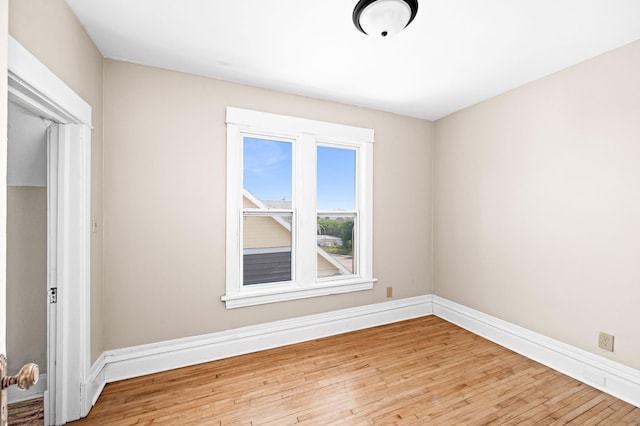 808 6th Ave E, Duluth, MN 55805 - spare room featuring hardwood / wood-style flooring and baseboards