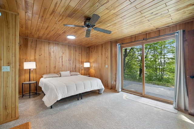 36388 Wabana Rd, Wabana Twp, MN 55744 - bedroom with access to exterior, wooden ceiling, carpet, wooden walls, and a ceiling fan