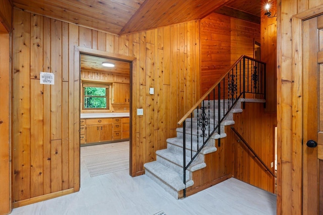 36388 Wabana Rd, Wabana Twp, MN 55744 - stairs with wood ceiling, wood walls, and vaulted ceiling