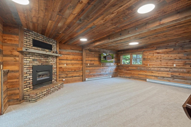 36388 Wabana Rd, Wabana Twp, MN 55744 - unfurnished living room featuring baseboard heating, wooden walls, wooden ceiling, carpet, and a brick fireplace