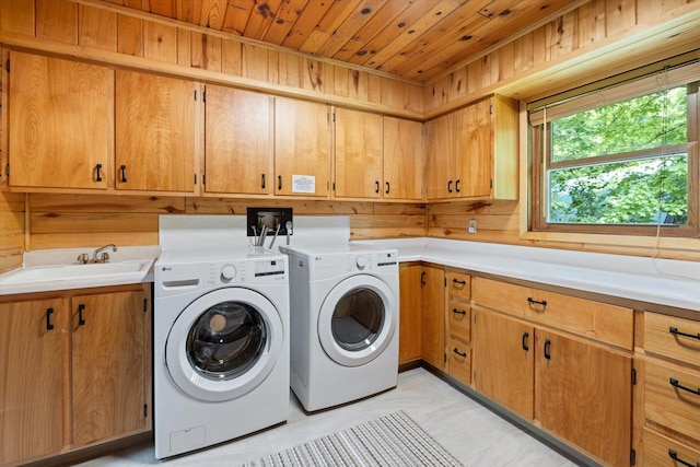 36388 Wabana Rd, Wabana Twp, MN 55744 - laundry room featuring separate washer and dryer, cabinet space, and wooden ceiling