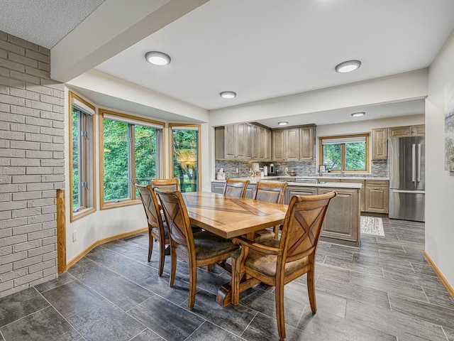 4125 Bridgewater Cir, Vadnais Heights, MN 55127 - dining space featuring baseboards
