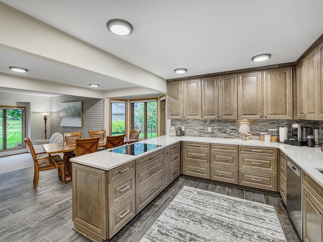4125 Bridgewater Cir, Vadnais Heights, MN 55127 - kitchen with dishwasher, black electric cooktop, healthy amount of natural light, and a peninsula