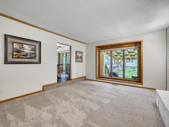 4125 Bridgewater Cir, Vadnais Heights, MN 55127 - carpeted empty room with ornamental molding and a textured ceiling