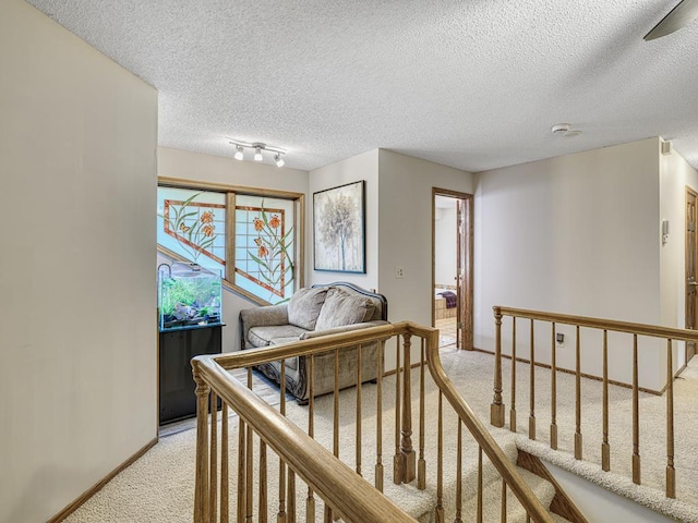 4125 Bridgewater Cir, Vadnais Heights, MN 55127 - corridor featuring light carpet and a textured ceiling