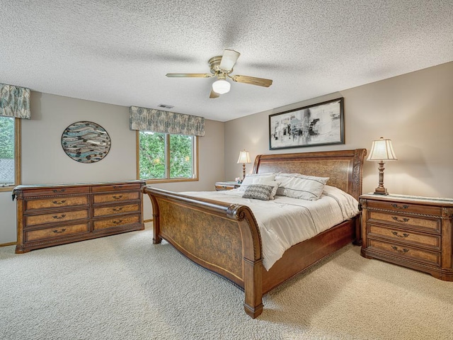4125 Bridgewater Cir, Vadnais Heights, MN 55127 - carpeted bedroom featuring a textured ceiling and a ceiling fan