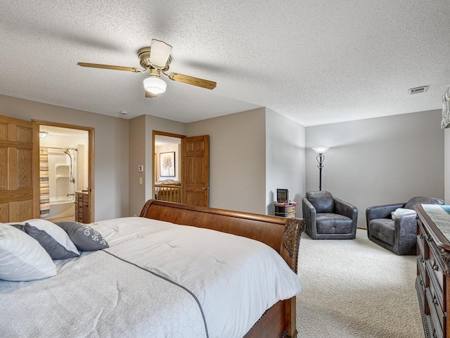 4125 Bridgewater Cir, Vadnais Heights, MN 55127 - carpeted bedroom featuring a ceiling fan, a textured ceiling, and ensuite bathroom