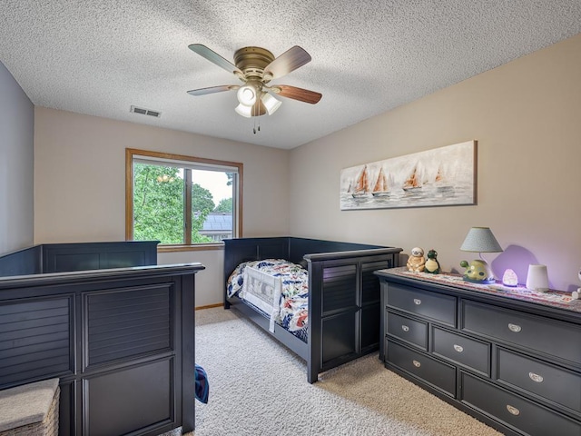 4125 Bridgewater Cir, Vadnais Heights, MN 55127 - bedroom featuring light colored carpet, a ceiling fan, and a textured ceiling