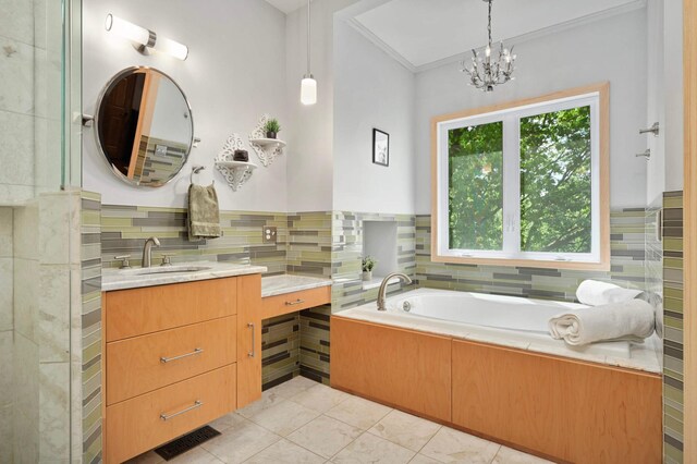 3583 Woodland Trl, Eagan, MN 55123 - bathroom with vanity, a garden tub, tile patterned floors, a chandelier, and crown molding