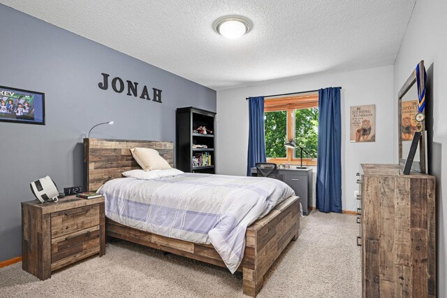 3583 Woodland Trl, Eagan, MN 55123 - bedroom featuring light colored carpet and a textured ceiling