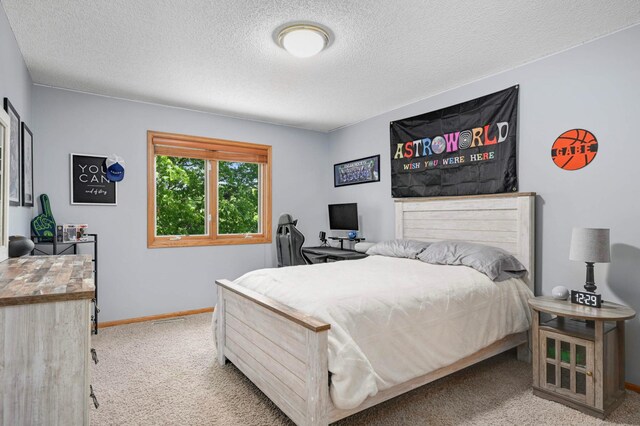 3583 Woodland Trl, Eagan, MN 55123 - carpeted bedroom featuring baseboards and a textured ceiling