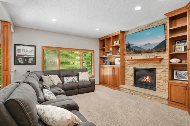 3583 Woodland Trl, Eagan, MN 55123 - living room featuring a textured ceiling, a stone fireplace, carpet flooring, and recessed lighting